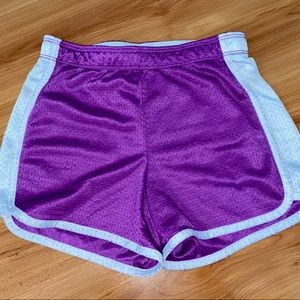 Justice active wear shorts , kids size 8 , blue and purple